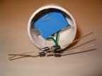 The capacitor is fully installed and all four diodes are ready for final connections.
