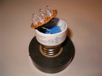 The LED board is connected to the power supply outputs and snapped into the case.
